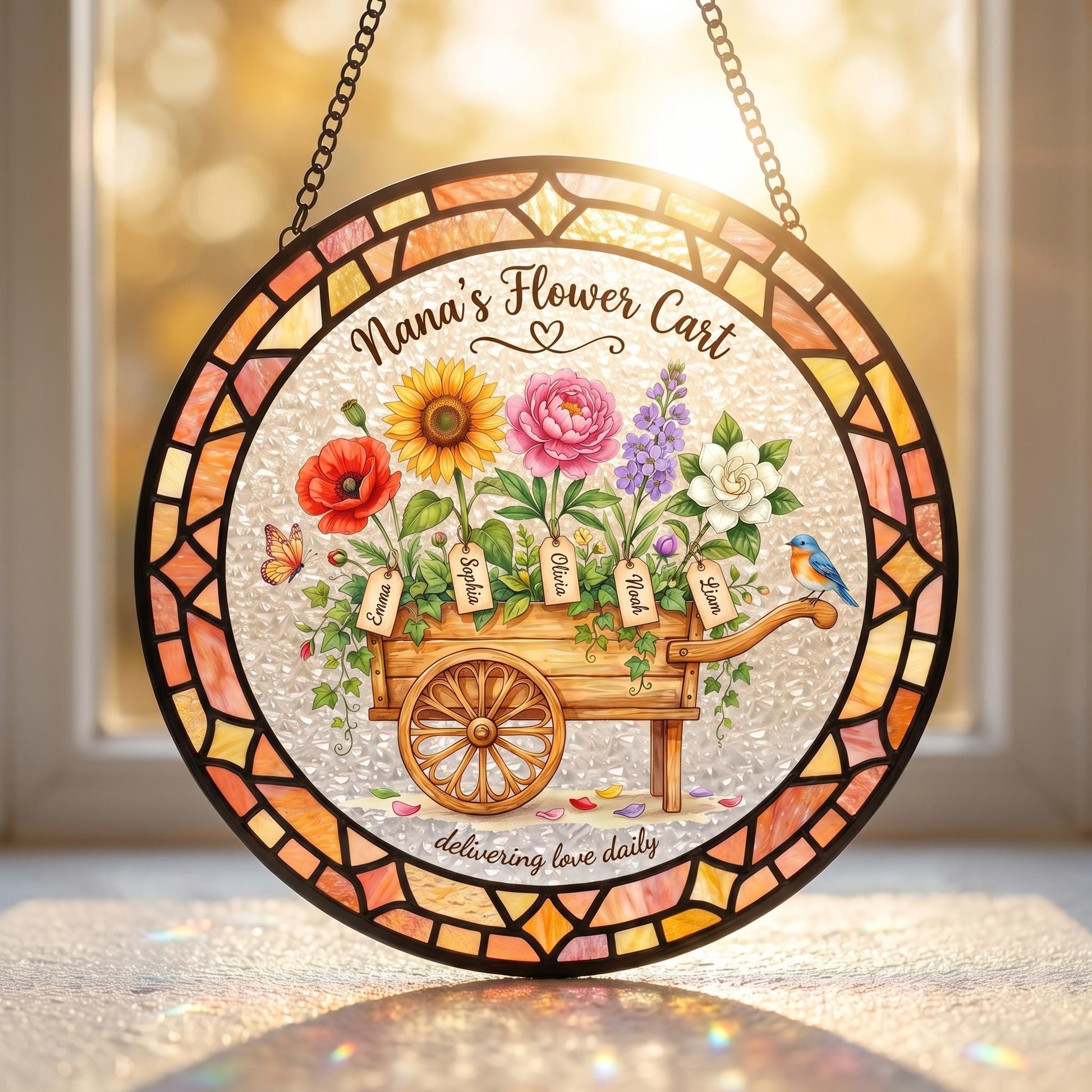 Custom flower cart suncatcher hanging in kitchen window with natural morning light creating colorful reflections