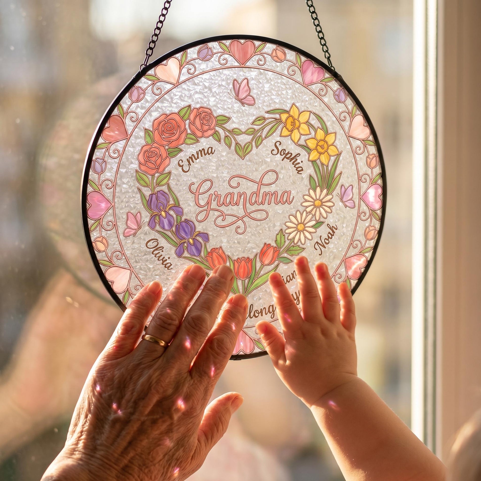 Close-up detail of heart garden suncatcher showing rose gold UV-printed lead lines, pink rose petals, water-ripple glass texture