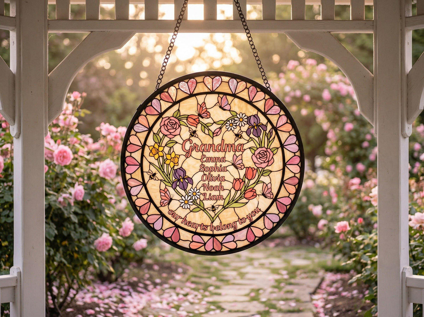 Artisan handcrafted heart garden suncatcher detail showing black lead came and hand-cut glass texture