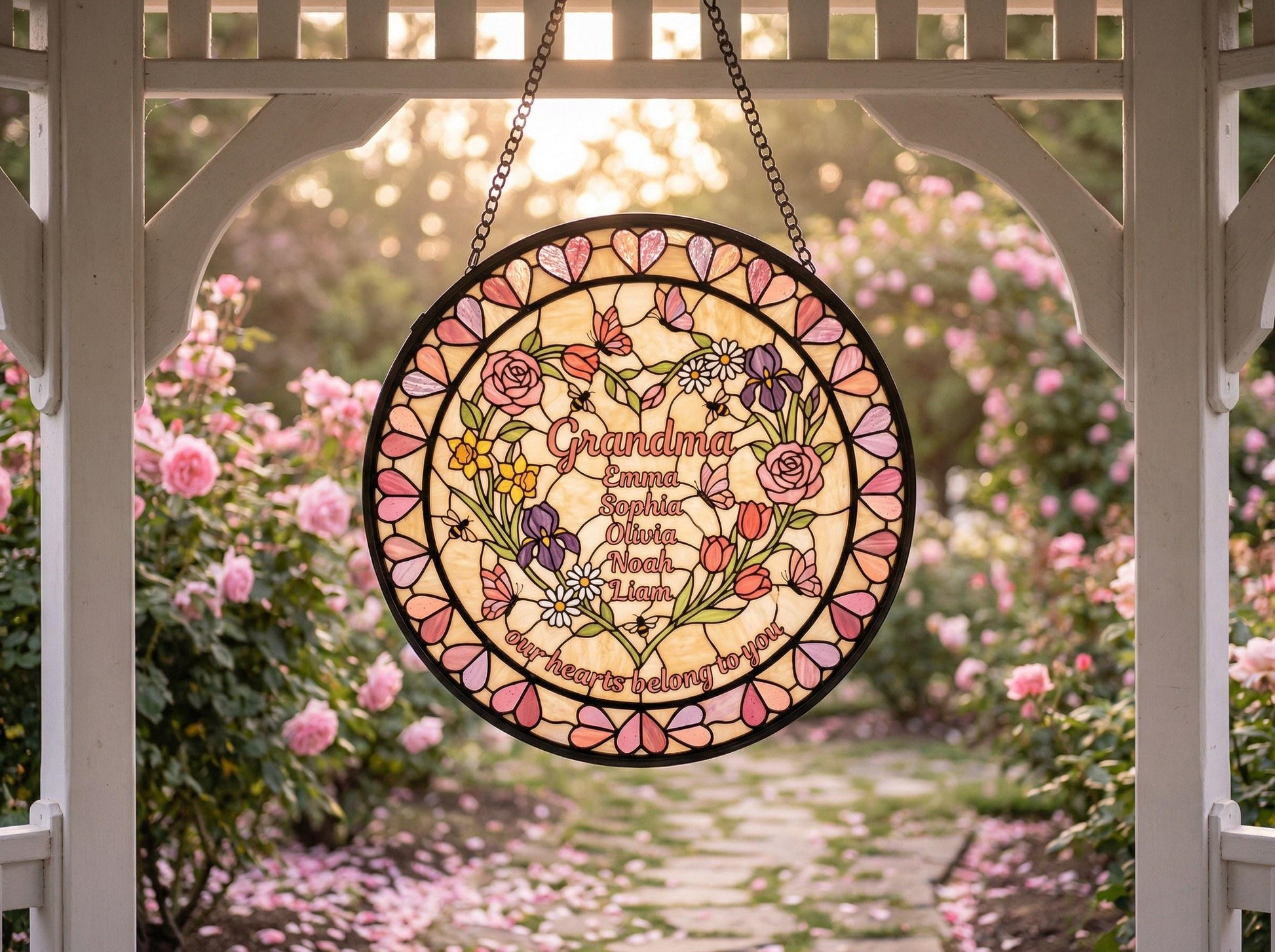 Artisan handcrafted heart garden suncatcher detail showing black lead came and hand-cut glass texture