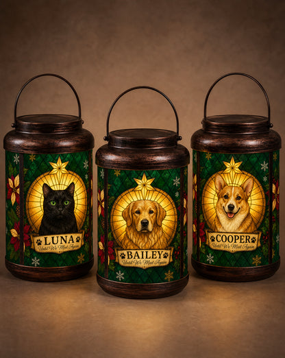 Three personalized Christmas memorial lanterns side by side with a black cat, a golden retriever and a corgi portrait, each with its own name — Luna, Bailey and Cooper